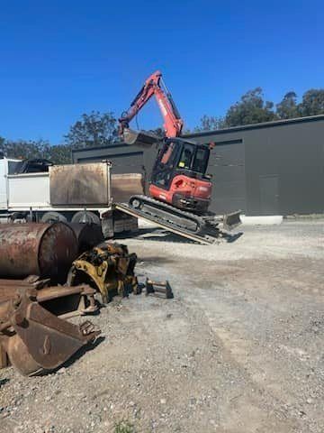 Mini Excavator Loaded into the Truck — Statement of Attainment Port Macquarie