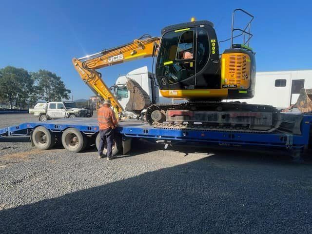 Flatbed Truck Loaded with Excavator— Verification of Competency Port Macquarie