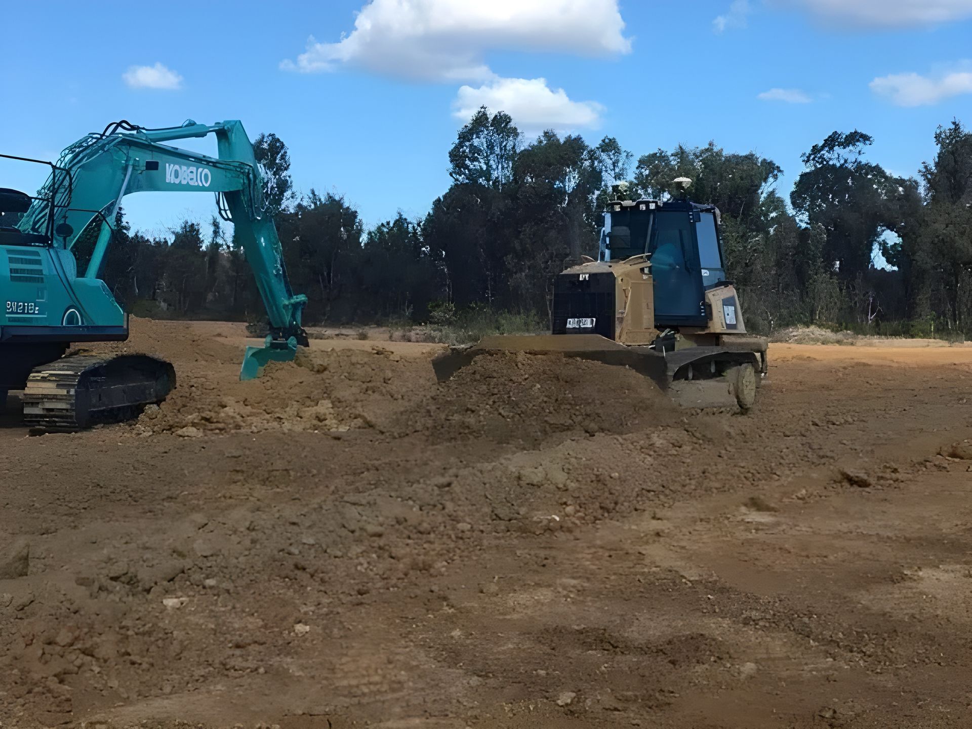 Busy Construction Site with Excavator and Mini Bulldozer — Plant Operator Courses Port Stephens
