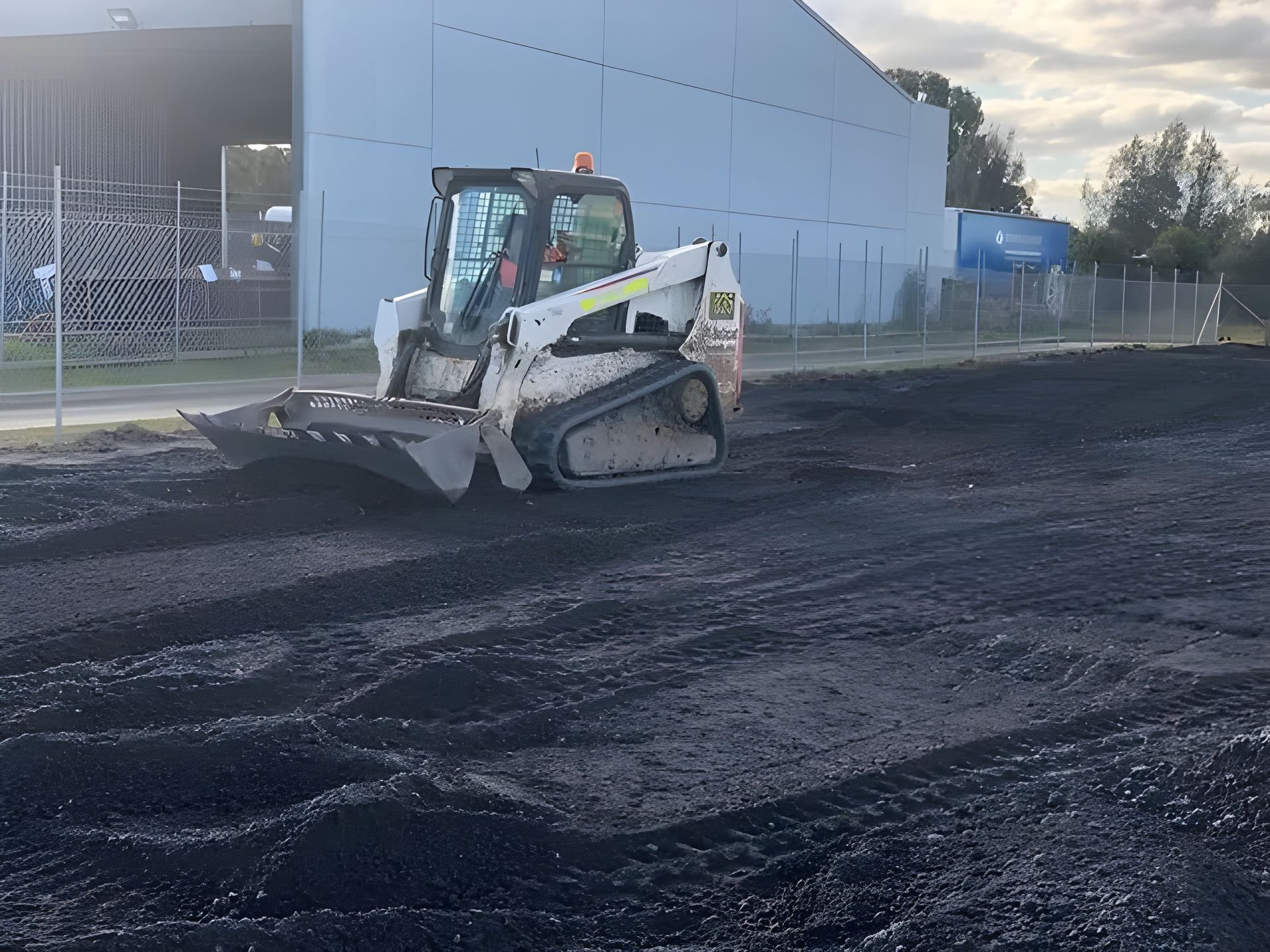 White Bulldozer Levelling The Dirt — Statement of Attainment Newcastle