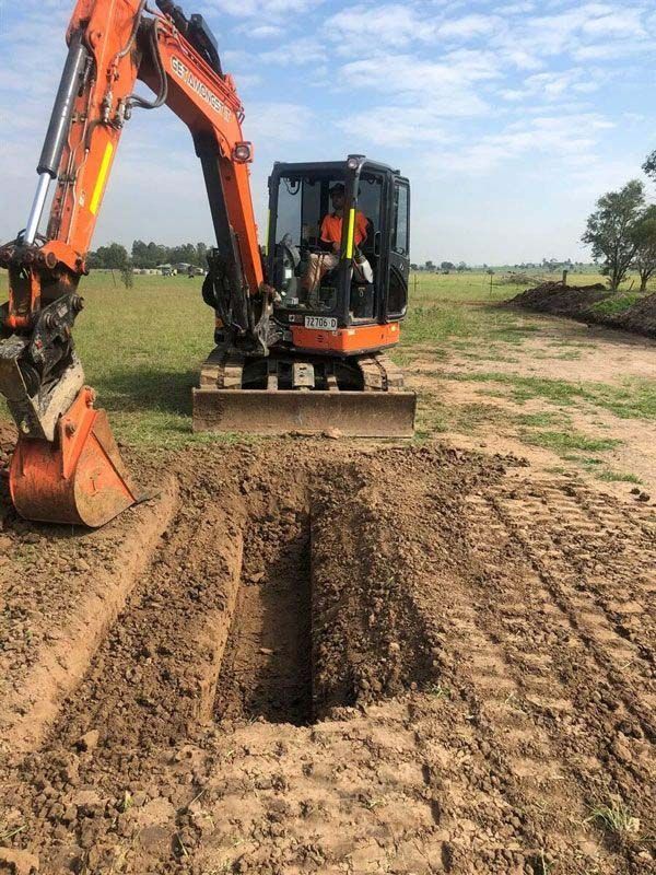 Excavator Digging A Trench — Plant Operator Courses Mid North Coast