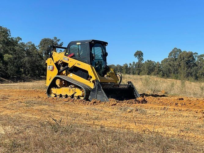Mini Yellow Excavator Scooping Up Dirt — Verification of Competency Maitland