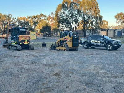 Heavy Equipment Parked in an Open Field — Verification of Competency Maitland