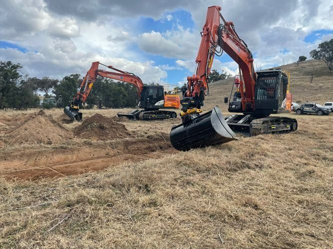 Two Excavators Digging — Plant & Machinery Training in the Hunter Region