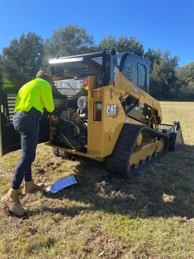 Man Fixing Construction Equipment — Statement of Attainment Newcastle
