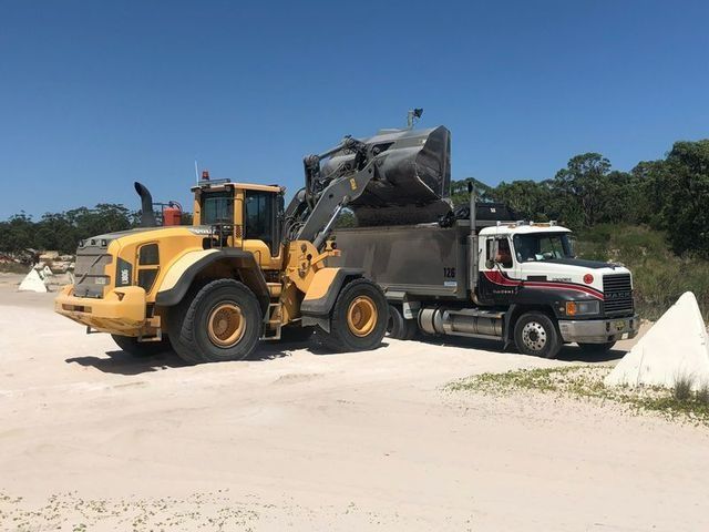 Bulldozer Loading Truck — Plant Operator Courses Hunter Region