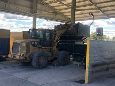 Bulldozer Loading Debris Into Bin — Plant Operator Courses Maitland