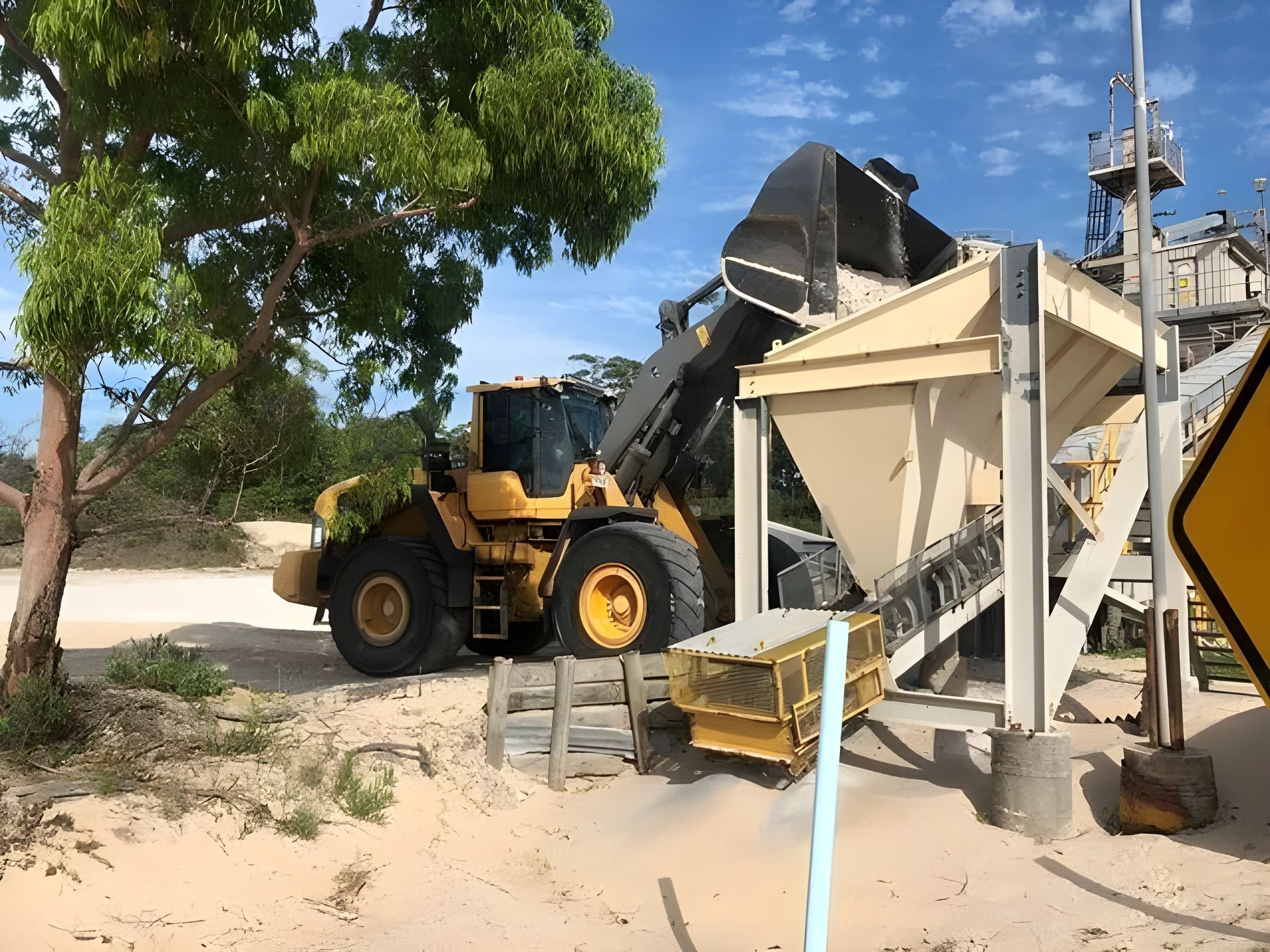 Backhoe Loader Loading the Crusher — Statement of Attainment Maitland