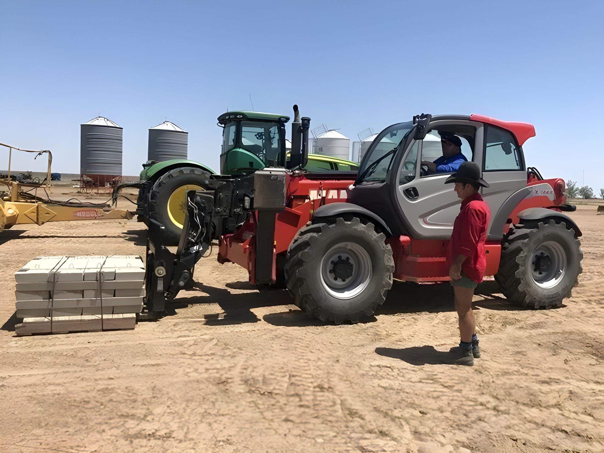 Man using Forklift to Lift Heavy Concrete Slabs — Plant Operator Courses Muswellbrook