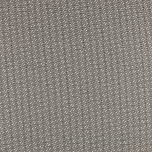 A close up of a gray fabric with white polka dots on it.