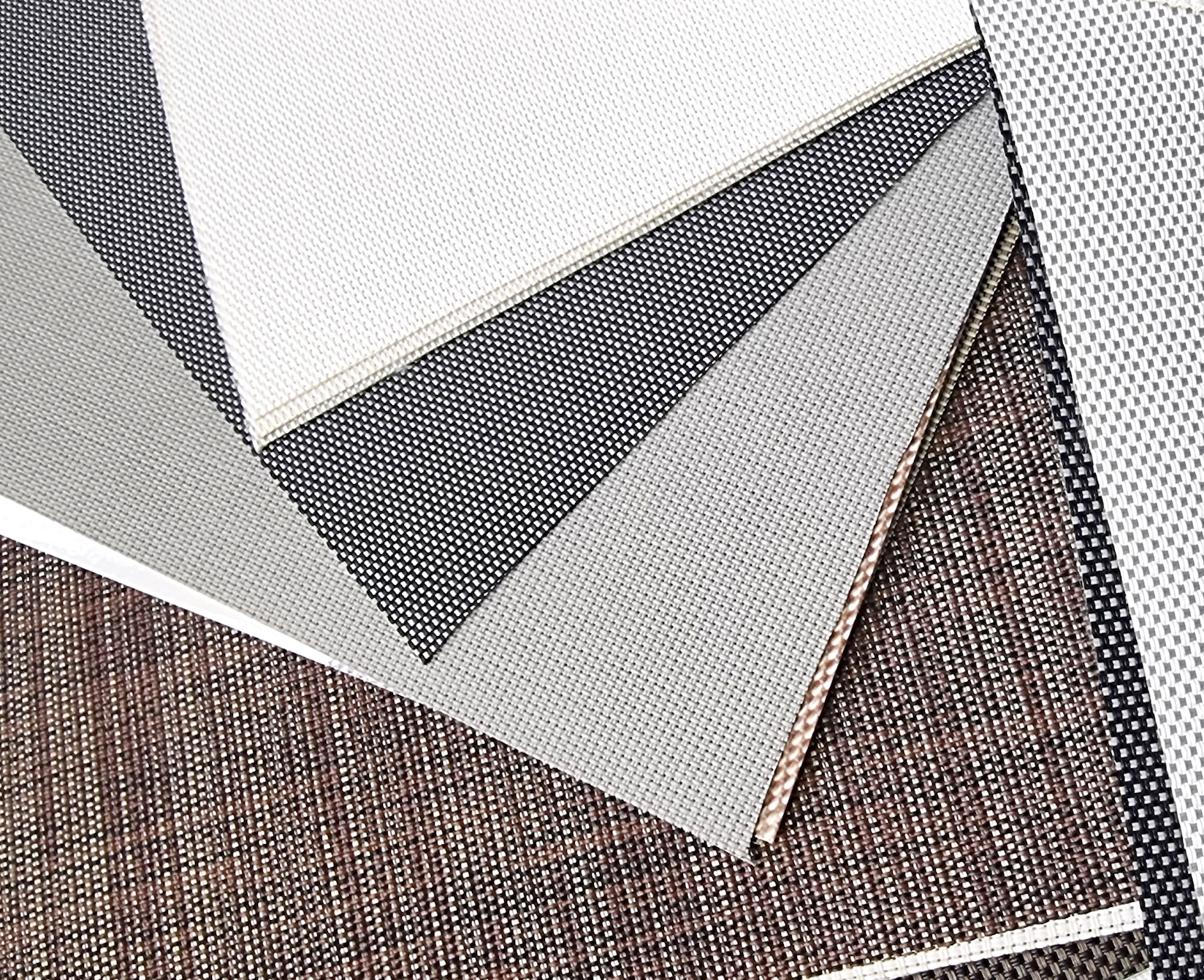 A close up of a piece of fabric that is white and black