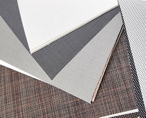 A close up of a piece of fabric that is white and black