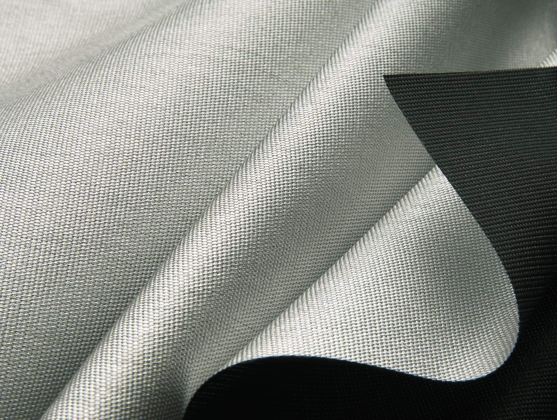 A close up of a piece of fabric that is white and black