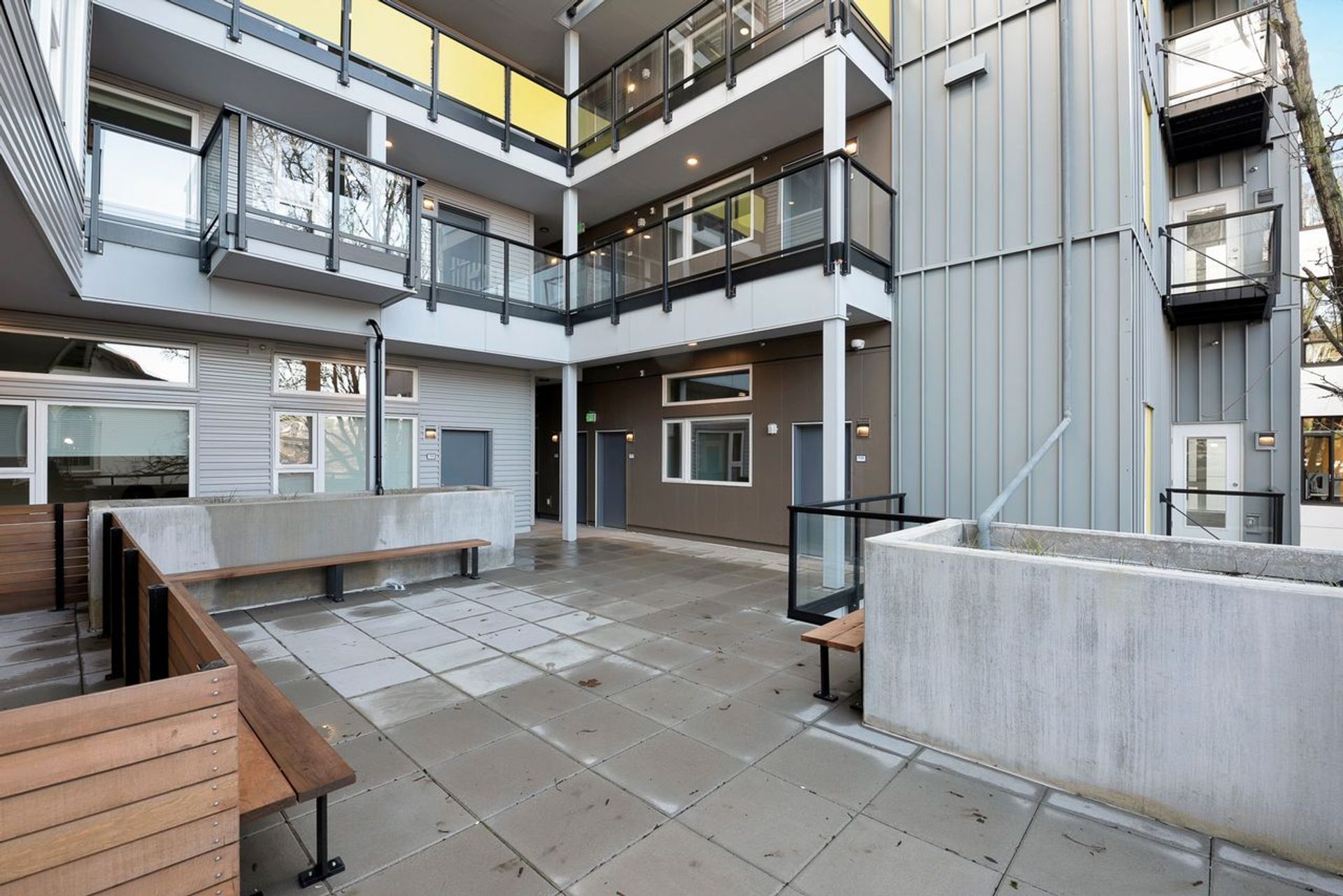 Photo of a courtyard kind of area with places to sit