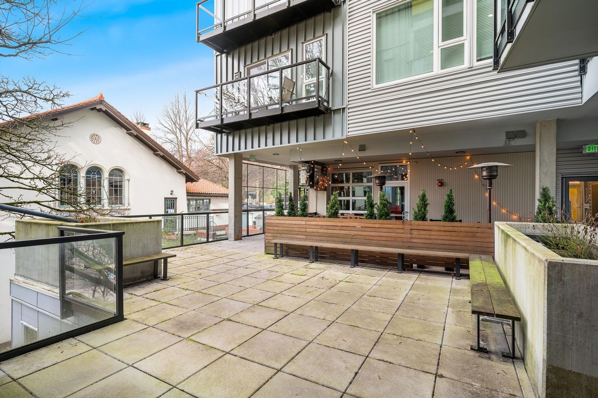 Photo of an outdoor rest and relaxation area with various places to sit