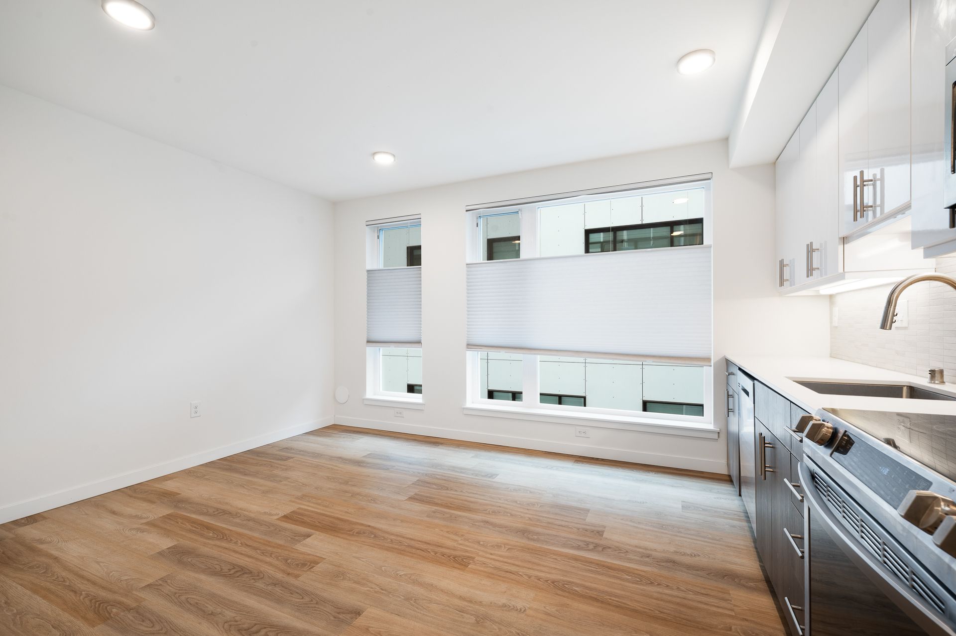 Photo of a kitchen and dining area with plenty of natural light