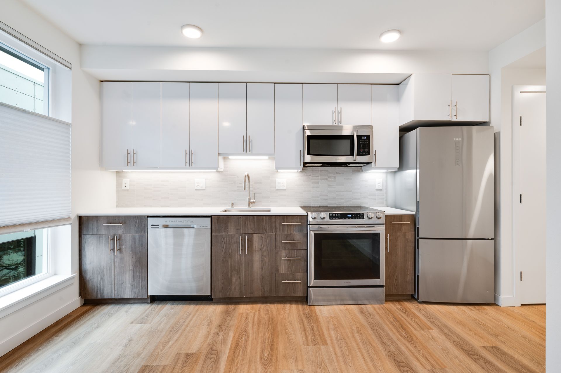 Photo of a kitchen with new appliances and plenty of natural light