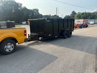 A living room filled with furniture and boxes.