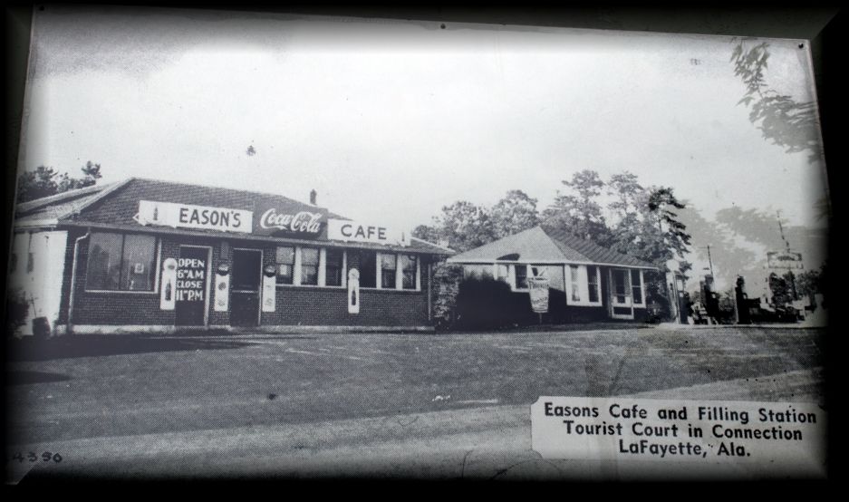 A black-and-white photo of Eason’s Cafe and Filling Station with tourist cabins in LaFayette, Alabama.