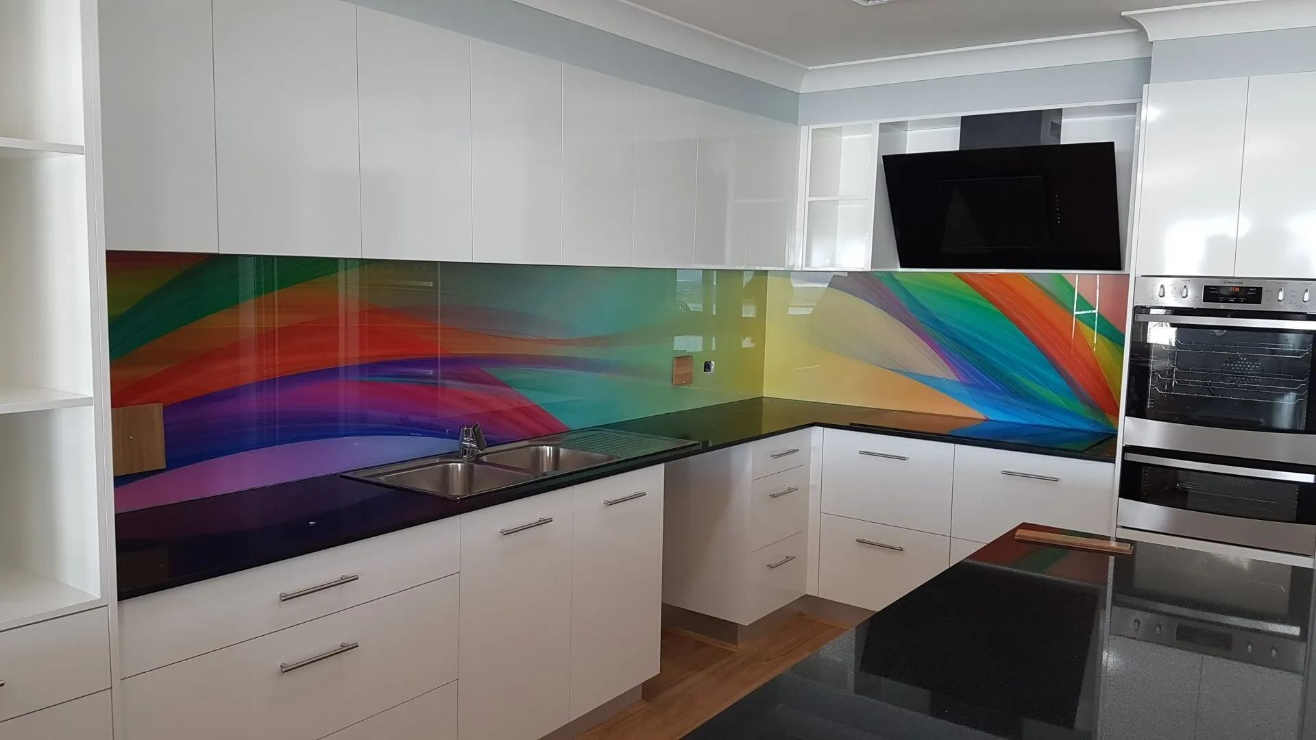 Decorative Rainbow Coloured Glass Kitchen Splashback — Glass in Wollongong, NSW
