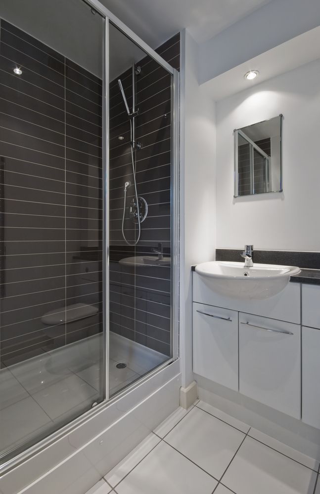 Bathroom With a Shower Cabin — Glass in Wollongong, NSW