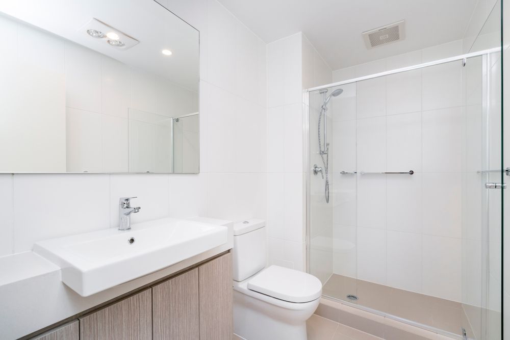 Modern Minimal Bathroom and Glass Shower Screen — Glass in Wollongong, NSW