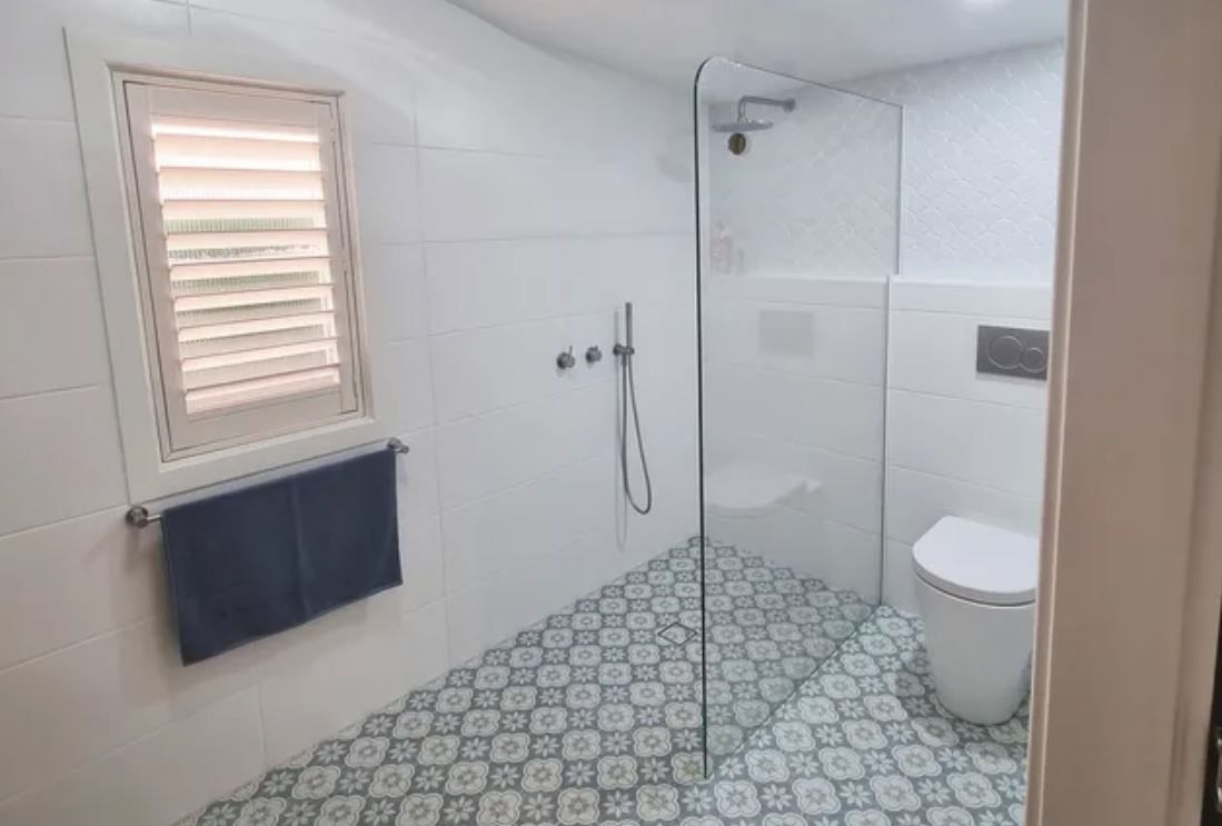 Modern Bathroom With Frameless Shower Screen — Langson Glass in Wollongong, NSW