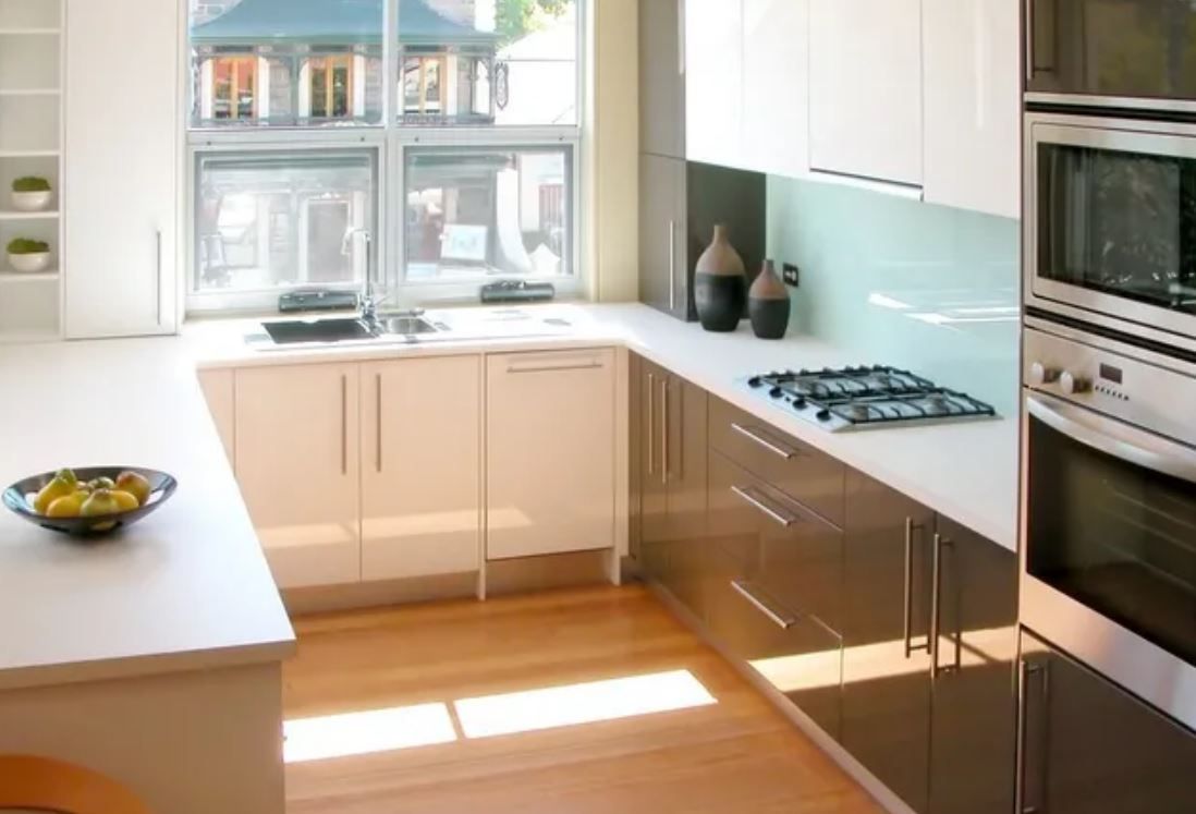 contemporary modern kitchen with a glass splashback - woolongong nsw