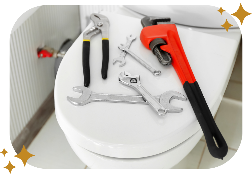 A toilet seat with a wrench and pliers on it