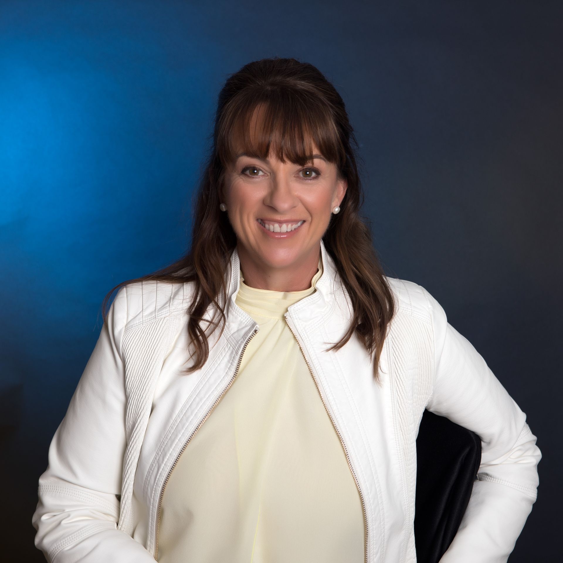 Headshot Image of Kym in a White Jacket — Kym Connolly Wellness Coach in Svensson Heights, QLD