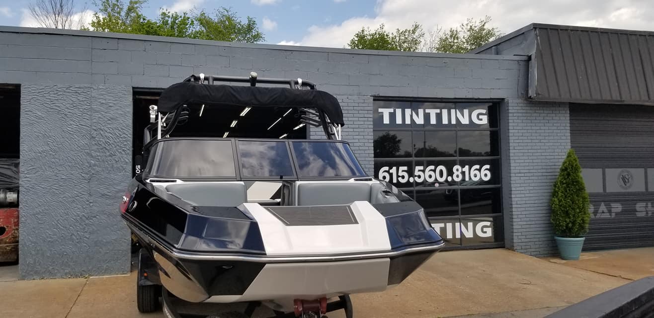 Boat parked in front of a 