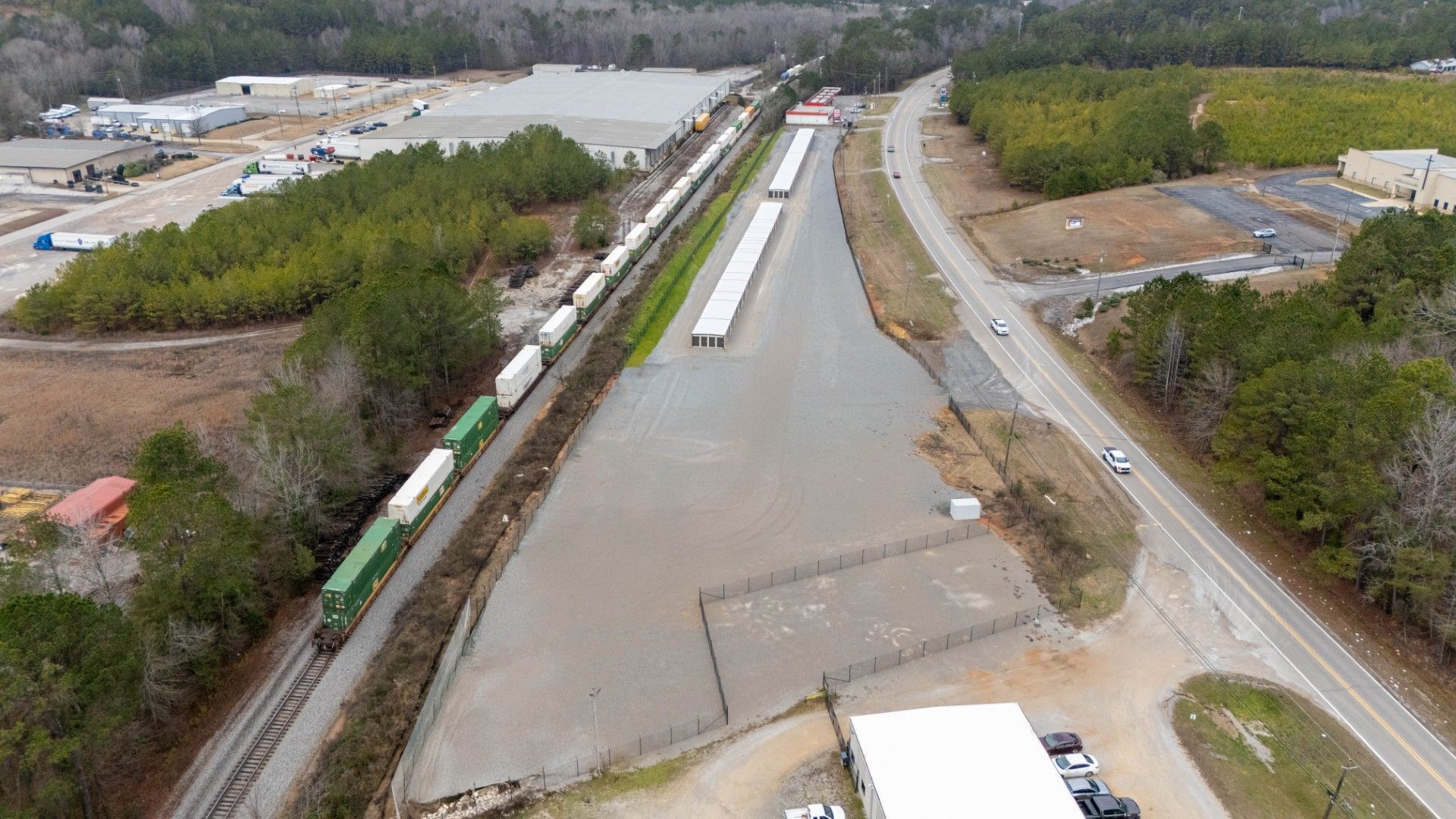 A row of green and white storage units in a hallway.