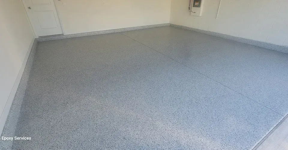 Grey epoxy coated garage floor.