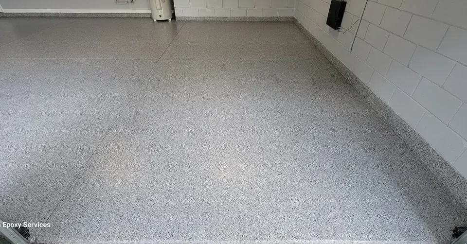 Gray speckled epoxy garage floor.