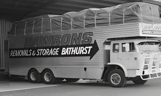 Black And White Photo of A Removals & Storage Bathurst Truck Parked on A Street — Dawson's Removals In Kelso, NSW