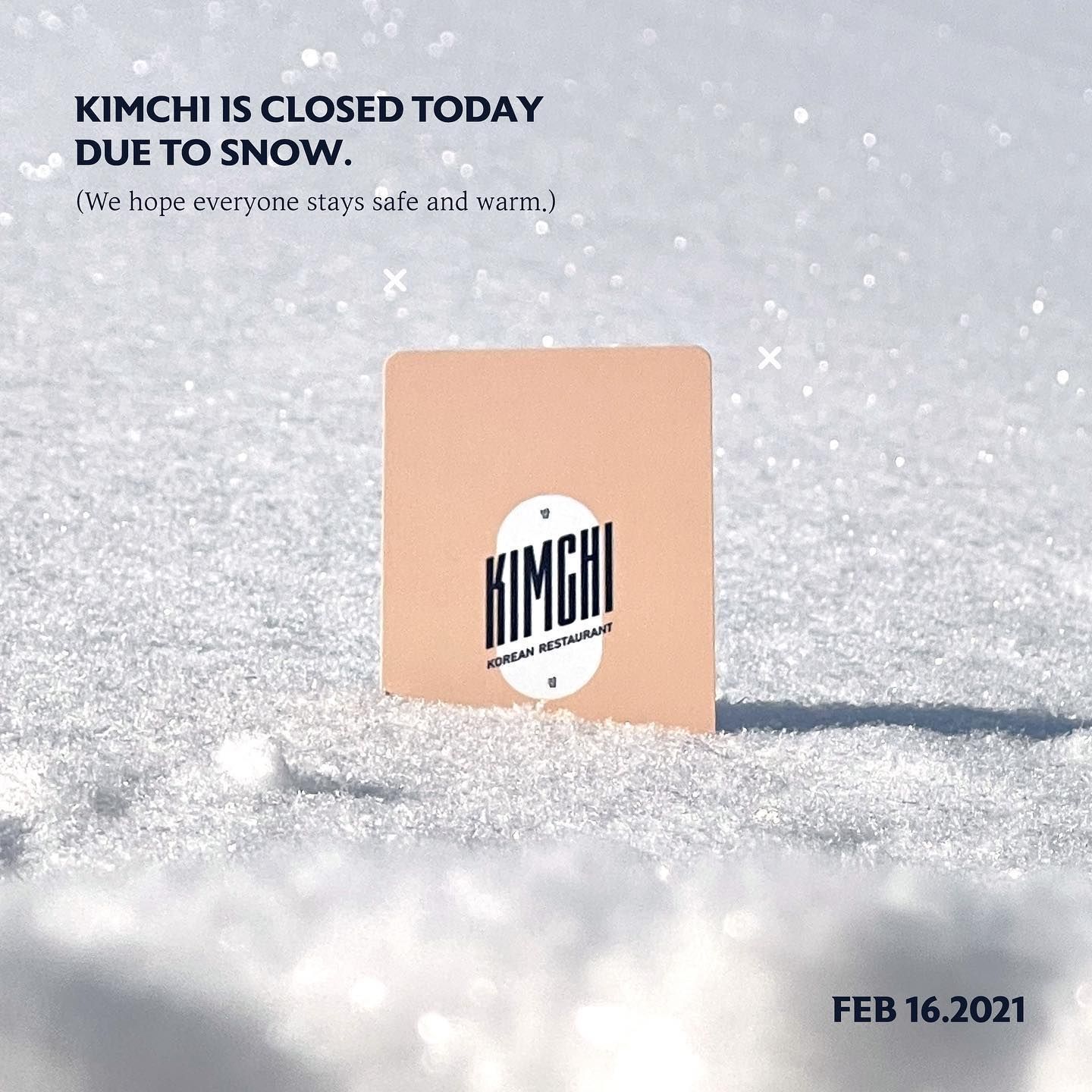 A card that says kimchi is closed today due to snow