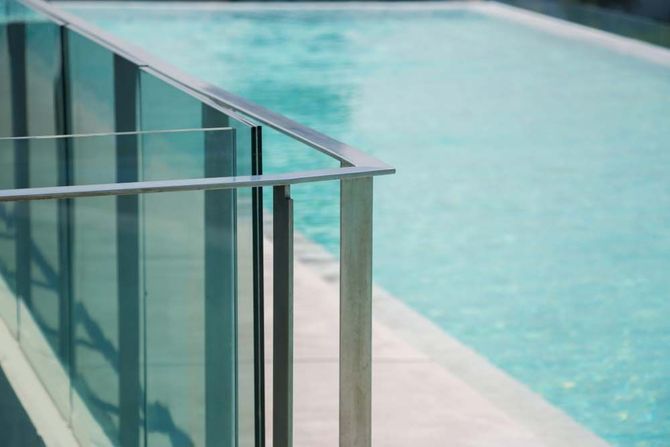 Closeup Modern Flat Stainless Railing and Glass Wall — Pool Shop in East Ballina, NSW