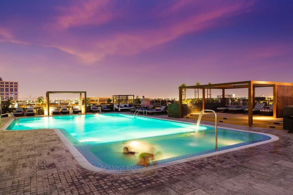 Luxury Rooftop Swimming Pool with Elegant Lighting — Pool Shop in East Ballina, NSW