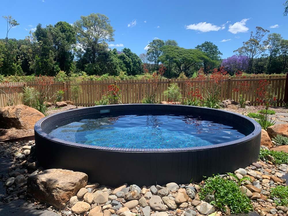Spa Surrounded by Rocks — Pool Shop in East Ballina, NSW