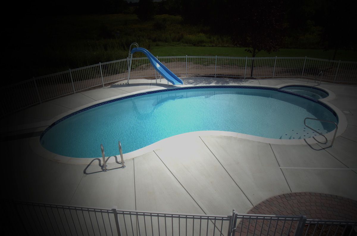 Custom Swimming Pool With Blue Water Slide — Warren, MI  — Sardelli Custom Pools