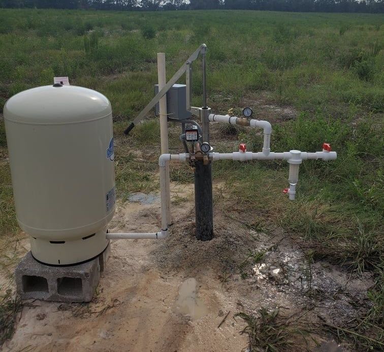 Two water pumps are sitting on a white table