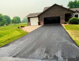 driveway with a garage