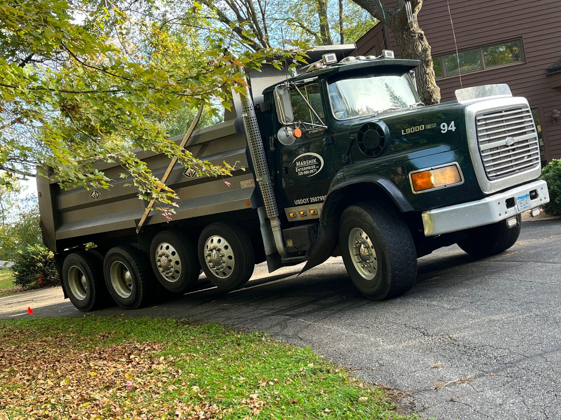 a large truck parked on the side of a road