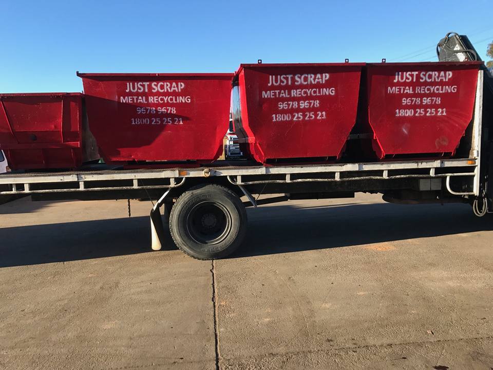 truck with red recycling bins