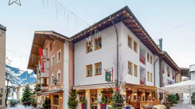 Lake, Slopes, and Alpine Charm