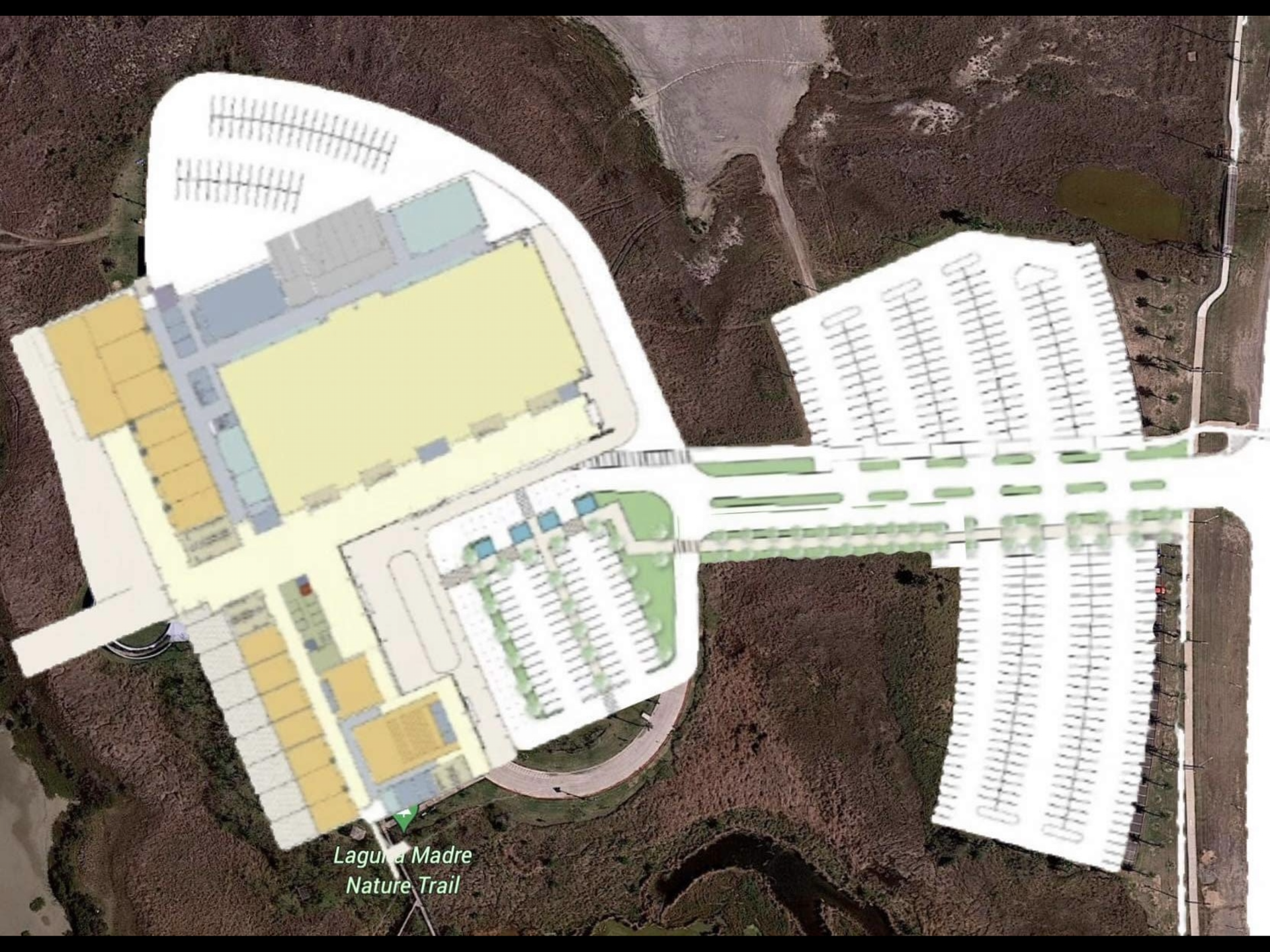 An aerial view of a large building with lots of parking spaces