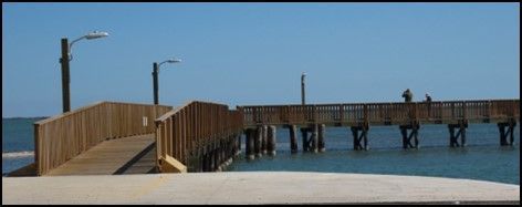 A wooden bridge over a body of water