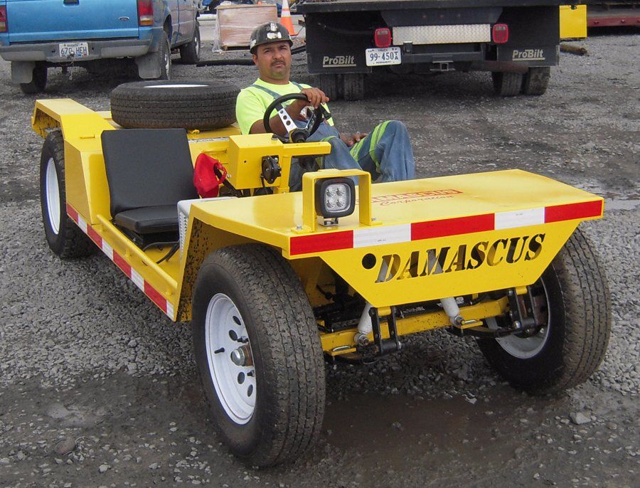 Man in a yellow cart with 
