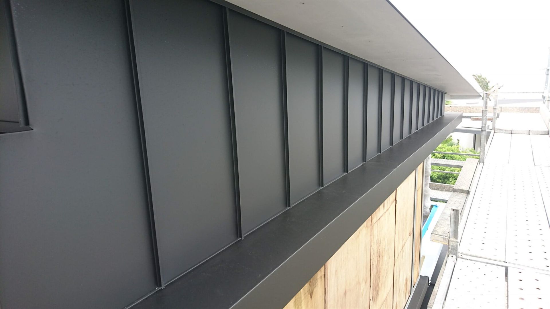 Wall Cladding in Angle Standing Seam System in Matt Black Prefa Aluminium