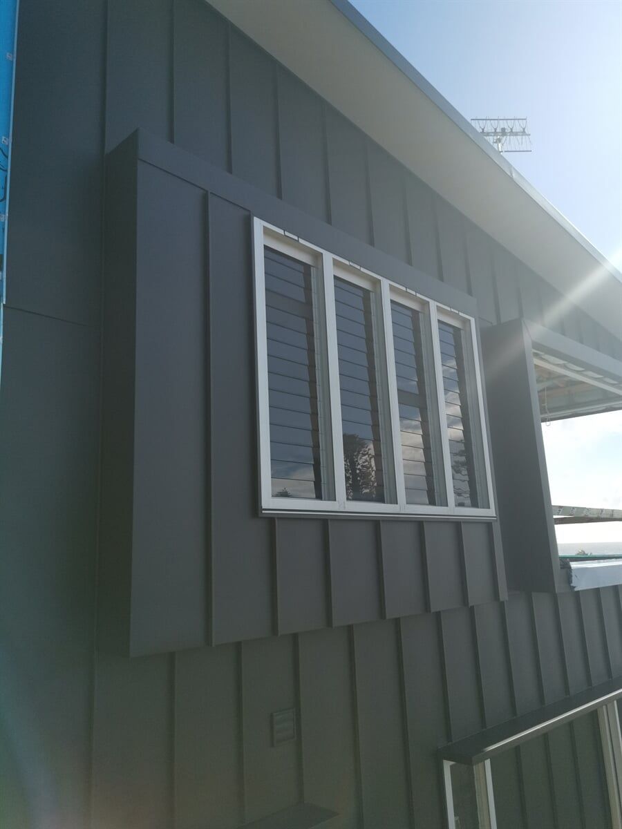 Wall Cladding in Angle Standing Seam System in Matt Black Prefa Aluminium